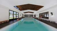 Our community will also include an indoor lap pool…perfect for when the weather gets colder! This is an artist’s rendering of the indoor pool. The indoor hot tub is not pictured in this rendering.