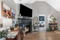 Gas fireplace and beautiful laminate flooring