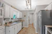This gorgeous kitchen offers ample cabinet space