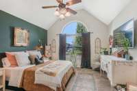 Vaulted ceilings and a gorgeous arched window make you feel like royalty