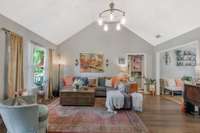 Tall vaulted ceilings in the living room make this an inviting space