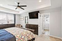 Primary Bedroom (doors lead into large walk-in closet & ensuite full bathroom)