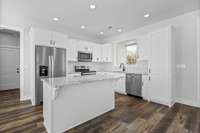 Kitchen with granite countertops, stainless steel appliances and an island!