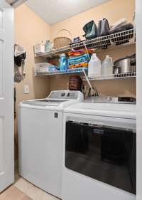 Utility closet, washer and dryer remain (washer has some spin cycle issues)