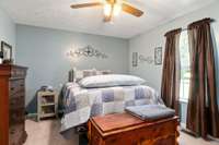 Master bedroom with full bath and walk in closet