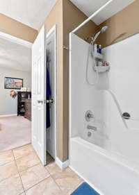 tub/shower combo plus linen closet