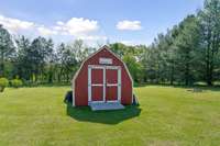 Storage bldg stays with property