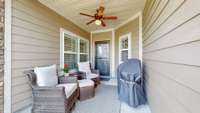 The home has a covered patio area, great for grilling.  This space also has a ceiling fan.