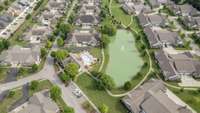 The neighborhood also includes a neighborhood pool and walking paths.