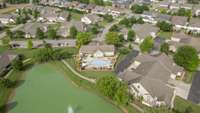 The neighborhood also includes a neighborhood pool and walking paths.