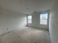 Bedroom 2 lets in a ton of natural light