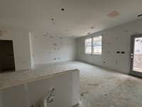 View from  kitchen island into the large living room