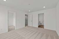Primary bedroom located upstairs- the walk in closet is massive