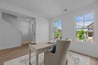 Upon entering, you have an open flex room that can be used as an office, bourbon room, formal dining room, or more