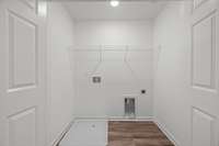 Laundry room  is conveniently located upstairs with all the bedrooms- No trecking up and down with your laundry