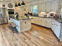 Cabinets ......... and more Cabinets complete the room with more than enough space for multiple cooks and 'samplers'!