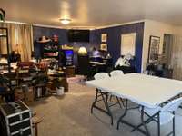 The expansive versatile space which is currently an office.