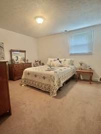 Upper apartment, one of the two bedrooms.