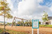 A Tot Lot is included as part of the community amenities in Durham Farms.