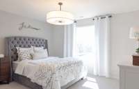 ***Photo from a Riverview model home in another community***  This is an example of one of the three spacious 2nd floor Bedrooms.