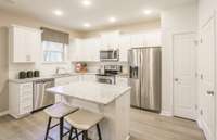 ***This picture was taken from an Aspire Model***  Kitchen