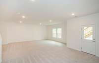 ***Photo taken from a previously built Aspire home with Basement***  This space is set up to offer flexibility in how you use the space. You could have a secondary entertaining space downstairs and playroom in a portion of it as well.