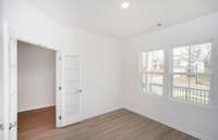 ***Photo taken from a previously built Aspire home with Basement***  The 1st floor includes a flex space that can be used for a home office or a formal dining room! French doors are included for added privacy.