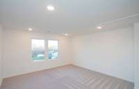 ***Photo taken from a recently completed Hampton home in the community***  A spacious Loft is located on the 2nd floor.