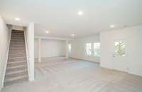 ***Photo taken from a recently completed Hampton home in the community***  Rare Walk-Out Basement offers substantial space for versatile use to fit for your lifestyle!