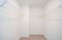 ***Photo taken from a recently completed Hampton home in the community***  Owner's Walk-In Closet
