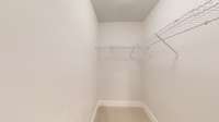 ***Photo taken from the Furman model home in Durham Farms***  Bedroom #2 also includes a walk-in closet.