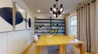 ***Photo taken from the Furman model home in Durham Farms***  Located on the 1st floor is the Flex Space, perfect for those needing a home office of craft room.