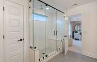 ***Picture Taken From Valleybrook Model Home In Millstone***  The Owner's Suite also includes a tiled shower with a rainfall shower head and a seat.