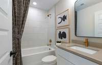 ***Picture Taken From Valleybrook Model Home In Millstone***  Bath #3 also includes tile flooring and quartz countertops.