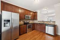 Another view of the kitchen over looking the main living area