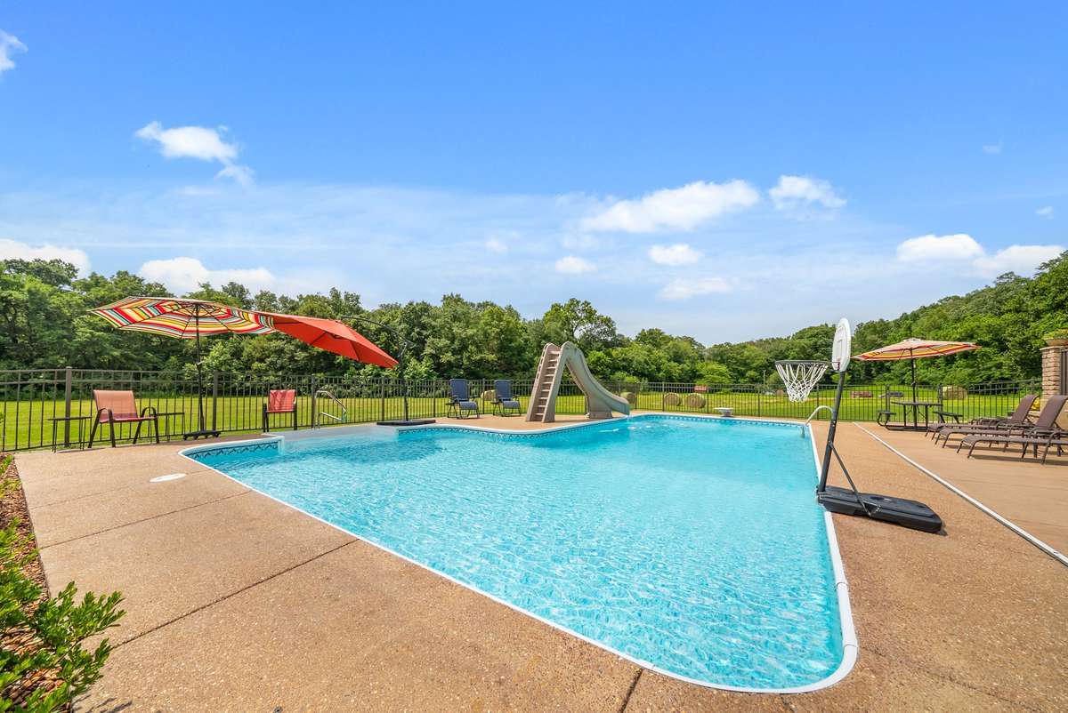 Your oasis awaits! Sellers are including pool umbrellas, tables, and furniture so you will be set up to enjoy this summer!
