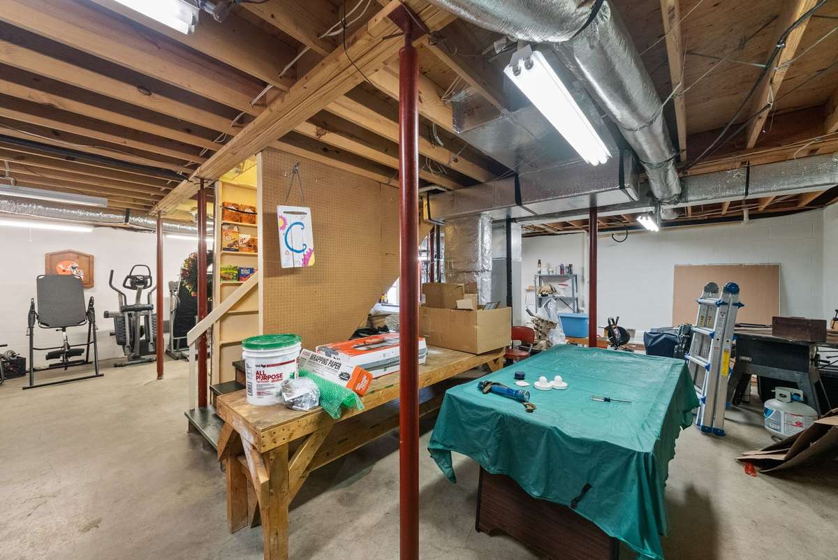 Basement with one car garage area