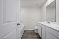 Double vanities in owner's suite