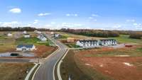 A bird's eye view of the community - fitness center, baseball field, splash pad, playground, dog park, and more coming soon