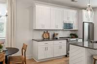 Photos are of similar home and selections to vary.