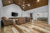 Living room with a soaring wood ceiling