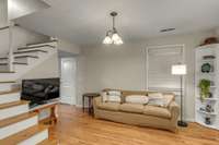 Large living room with it's access to it's own front porch.