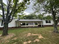 2 homes attached to a breezeway.