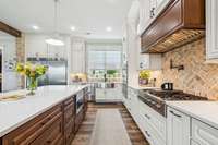 Sleek quartz countertops, custom cabinetry, and designer lighting elevate the overall look and feel.  8385 Lascassas Pike Lascassas, TN 37085