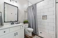 The full bath offers a tiled stand-alone fully handicapped accessible shower and a sleek single vanity. 8385 Lascassas Pike Lascassas, TN 37085