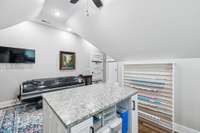 A central workspace island with a granite countertop adds extra functionality and storage, making it ideal for any hobby or DIY enthusiast. 8385 Lascassas Pike Lascassas, TN 37085