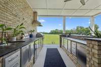 The full outdoor kitchen with granite countertops on the covered patio is a true entertainer’s dream! 8385 Lascassas Pike Lascassas, TN 37085
