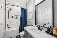The third full bathroom is a single vanity with a modern combo shower/tub. 8385 Lascassas Pike Lascassas, TN 37085