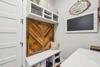 Just off the eat-in area, a convenient mudroom offers additional counter space, cubbies, and cabinet storage. 8385 Lascassas Pike Lascassas, TN 37085