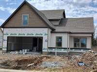 House under construction on Lot 113 is located on a Large Lot with a Private Backyard.